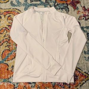 Girls white workout zip-up jacket.